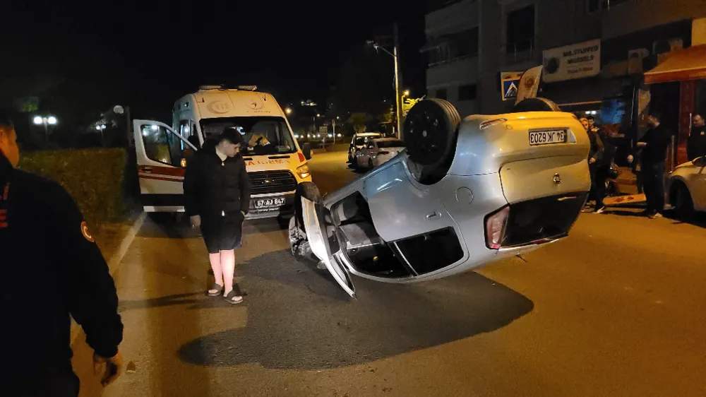 Park halindeki araca çarpıp takla attı